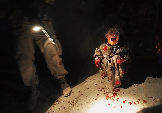 45. Iraqi Girl At Checkpoint, Chris Hondros, 2005