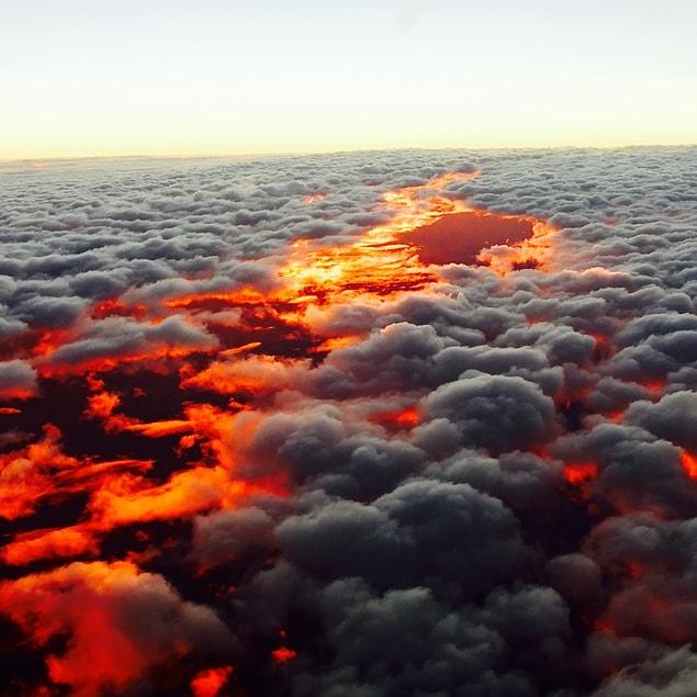16. Sunset from above the clouds over Australia