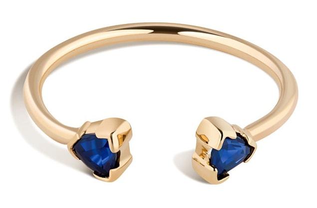 17. A unique, open-ended sapphire ring.