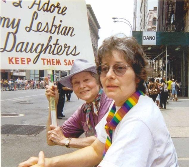 The sign itself was painted by a city planner, a dear friend of Goldin’s, because she believed you just couldn’t be at the parade without a sign. The message, “I adore my lesbian daughters,” instantly caught the attention of other parade attendees.