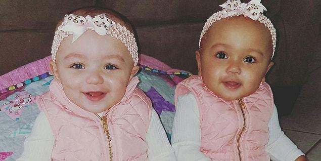 These two little girls may have striking differences in appearance, but not only are they sisters, they’re actually twins.