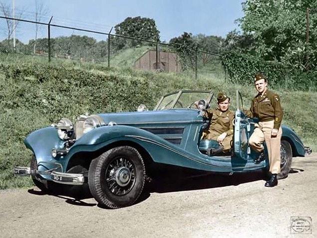26. American soldiers posing with a Mercedes 540K that belonged to Luftwaffe Commander-in-Chief Hermann Göring. 1945.