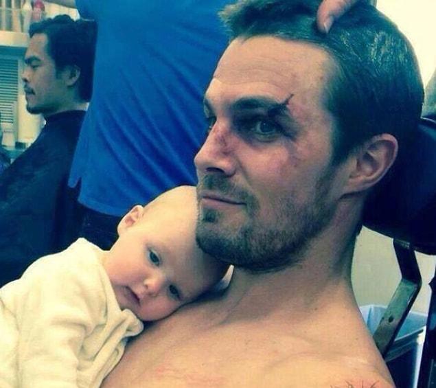 35. Stephen Amell on the set of Arrow with his daughter as a baby…