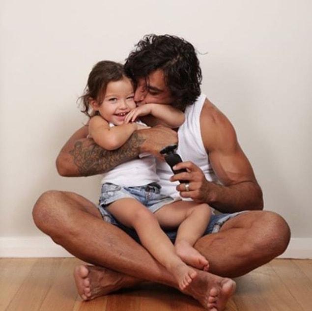 37. Aussie footballer Jonathan Thurston giving his eldest daughter some love.