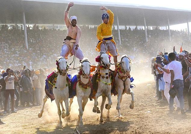17. Nihangs perform horse-riding stunts during the Hola Mohalla festival in Anandpur Sahib, India, on March 13.
