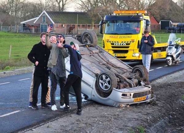 1. “I’ve just broke my neck and there’s still a dead guy in the car but lemme first take a selfie, because why not.”