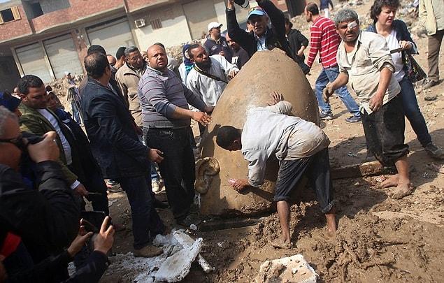 "We found the bust of the statue and the lower part of the head and now we removed the head and we found the crown and the right ear and a fragment of the right eye," said Khaled al-Anani, Egypt's antiquities minister
