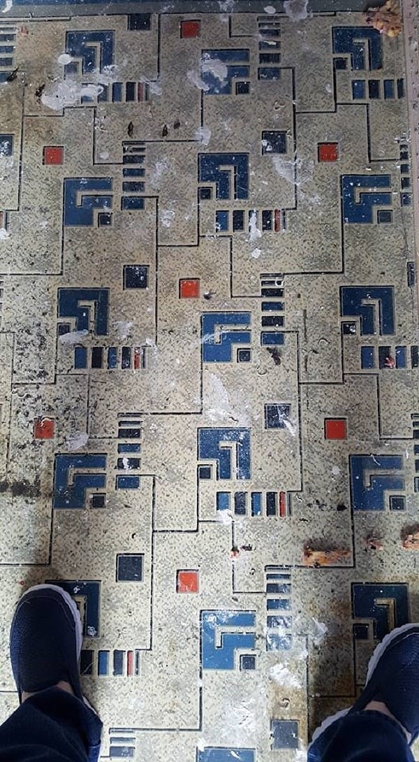 3. "Cousin was pulling up carpet in very old home and found this 'interesting' linoleum design."