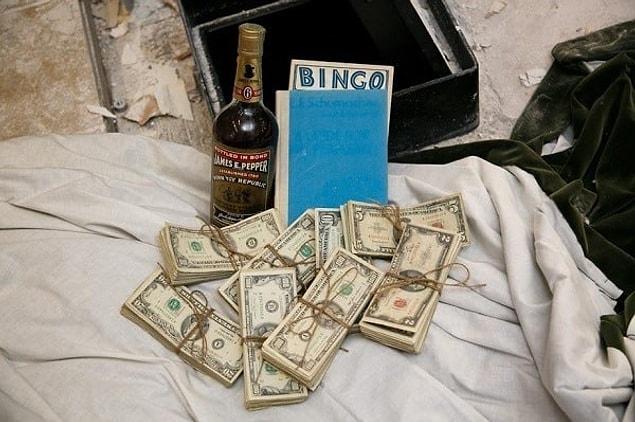 7. A couple renovating their kitchen discovered a safe in the floor. $50,000 in cold, hard cash, a rare bottle of bourbon, a book titled A Guide for the Perplexed, and a BINGO card.