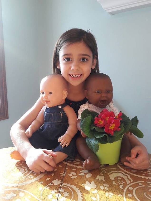 ''I love how kids don't see color. This is my 6 year old and her twin dolls.''