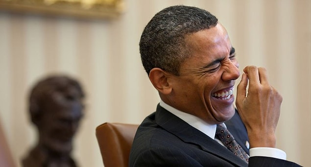 Michelle and President Obama had a good laugh with the server and Michelle reached into her purse and provided her credit card for payment.