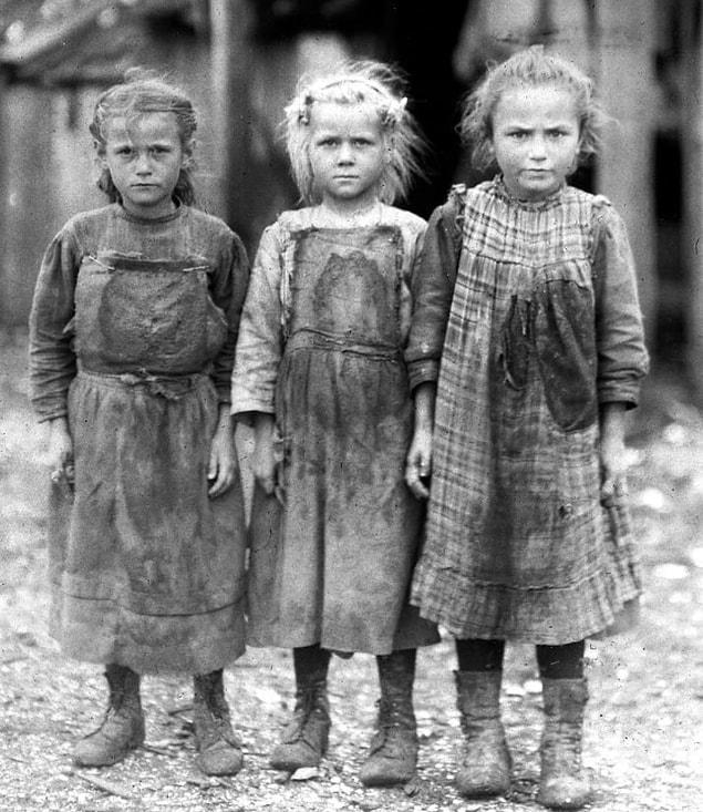4. A group of young girls on a break from their jobs as oyster shuckers at a seafood canning company in Port Royal, South Carolina, in 1911.