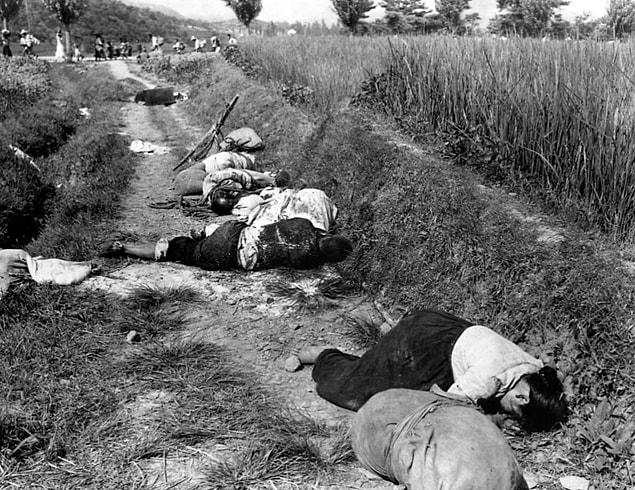 15. Korean civilians are killed after an attempt to flee from North Korean forces. They were caught in the line of fire during a night attack near Yongsan in August 1950.