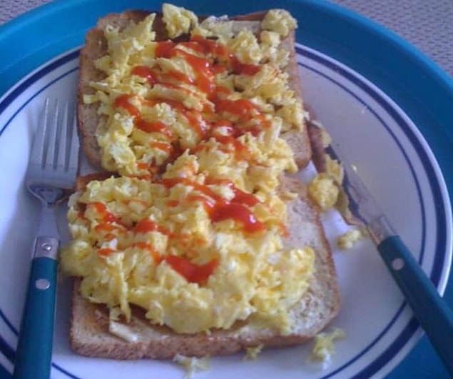 16. Scrambled eggs and ketchup on toast.