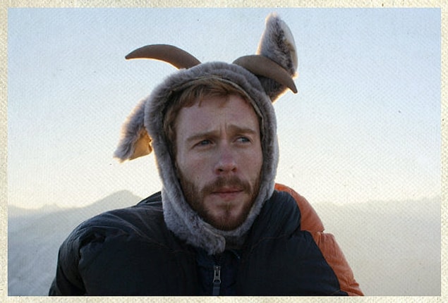 6. This horned furry cap appears to serve the dual purpose of keeping this sad Etsy boyfriend's head warm while also keeping him thoroughly uncomfortable.