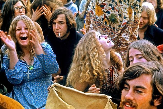 3. People in the crowd cheer as musical acts perform at the Altamont Speedway Free Festival on Dec. 6, 1969, California.