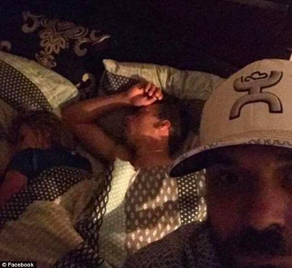 He started snapping photos of them in bed, and he even posed for a selfie in front of them.