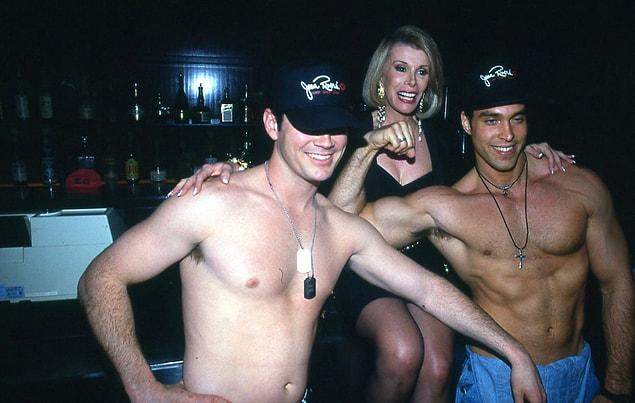 10. Joan Rivers posing with two shirtless guys at the 'Gossip' party.