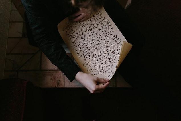 They enhanced their enchanted ceremony by writing their vows on Potter-worthy parchment.