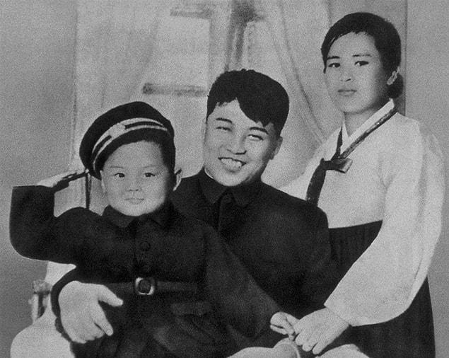 14. Kim Jong-il With His Father, Kim Il-sung, And His Mother, Kim Jong-suk In 1945