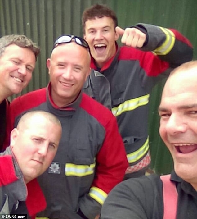 The firemen did their jobs quite happily thanks to Brandon's big smile. Here is the hero team!