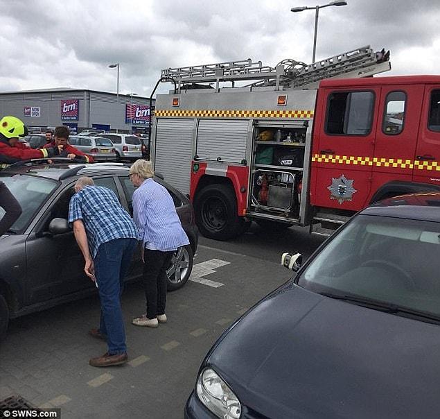 The crews were at first using small hand tools to attempt to free the toddler, but eventually had to smash the rear driver's window and climb into the car.