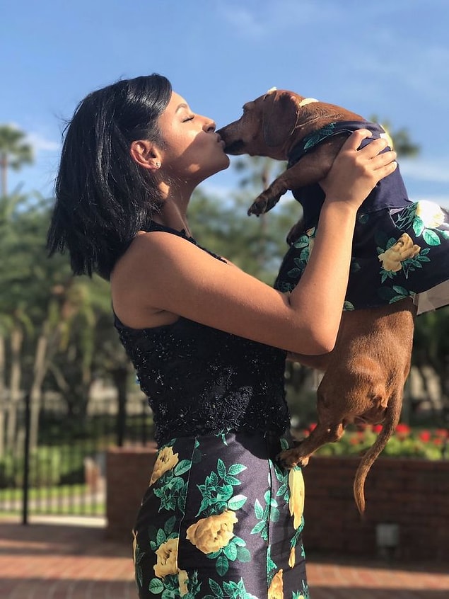 Don't think that Sasha is stressed in the pictures, Brenda reassures: “That’s her face most of the time,” and the pup really enjoyed the shoot: “She was really happy with everyone,” she said. “She was running around in the dress.”