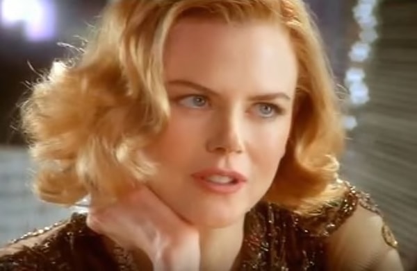 15. Николь снялась в клипе на песню Робби Уильямса "Something Stupid".