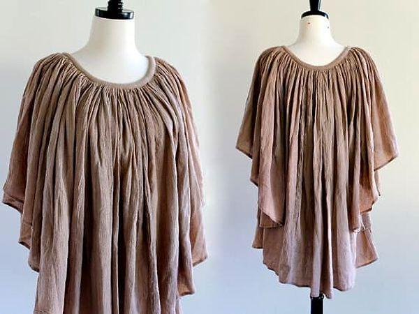12. The drape-style blouse you wore because it's big and should theoretically hide your boobs, but just makes them look even bigger than normal