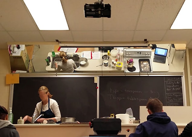 9. This cooking class has a mirror on the ceiling so the students can see what the teacher is doing.