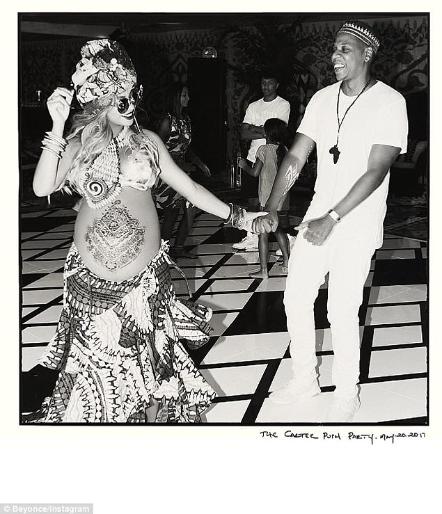 Queen Bey's baby bump looked amazing — bare except for an elaborate henna tattoo.