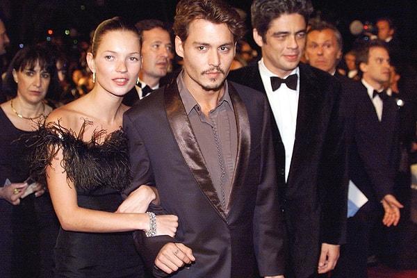 20. "Fear and Loathing in Las Vegas" filminin galasından Johhny Depp, Benicio Del Toro ve Kate Moss.