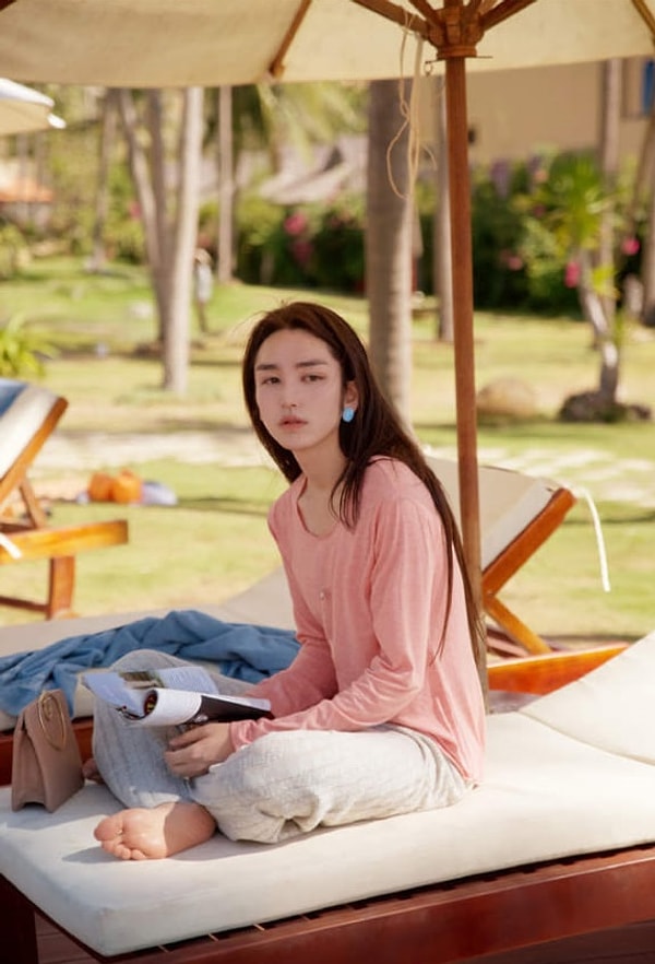 2. Китайский фотограф Синг Йи благодаря необычной внешности часто и сам выступает в качестве фотомодели.