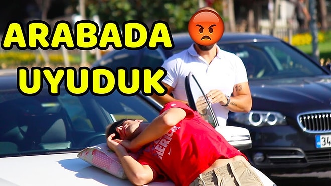 TRAFİKTE ARABALARIN ÜZERİNDE UYUMAK