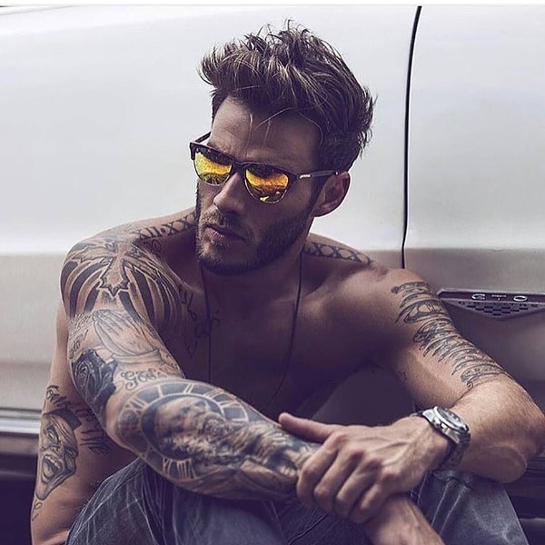 8. Тебя притягивают люди со множеством тату на теле?