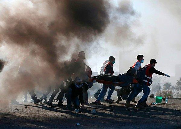 Filistin Sağlık Bakanlığı, İsrail-Gazze sınırında askerlerin gerçek mermi kullandığını belirtti.