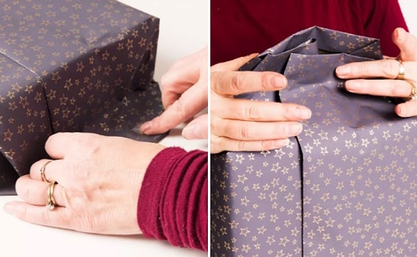 4. Заворачиваем оставшийся край бумаги, как показано на снимке.