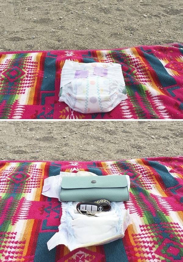 5. Plaja gittiğinizde bebek bezine değerli eşyalarınızı saklayabilirsiniz.