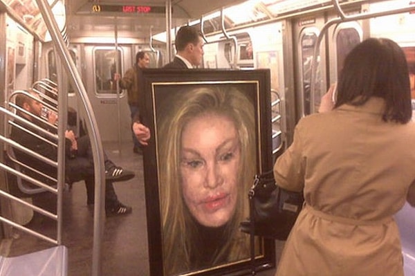 7. У кого-то очень странный художественный вкус. Заказать себе портрет "женщины-кошки", жертвы пластической хирургии. Зачем?