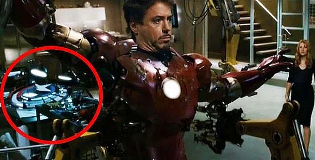 In Iron Man, you can notice Captain America's shield behind Tony Stark when Pepper Pots is helping him get out of his destroyed suit.