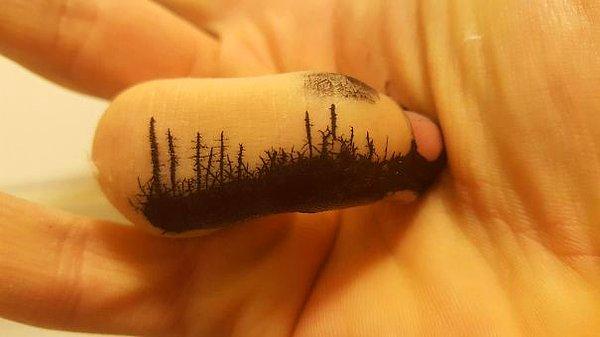 25. Orman yangını görüntüsü veren mürekkepli parmak