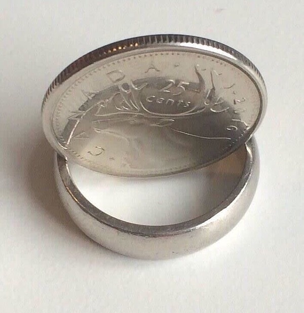 14. Кажется, как будто монета прозрачная.