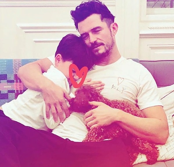 12. Орландо Блум с сынишкой и щенком