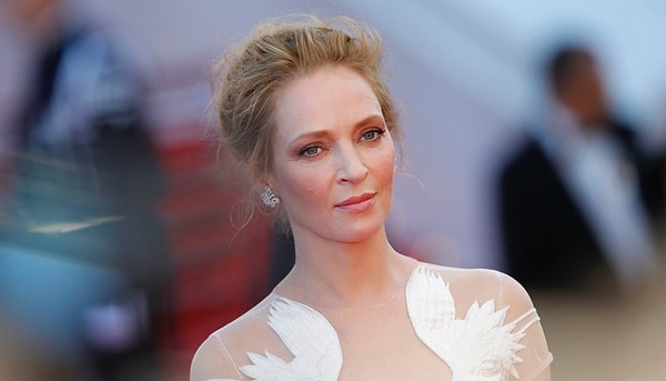 3. В детстве сверстники дразнили Уму Турман из-за некрасивых зубов. С тех пор звезда улыбается только уголками губ.