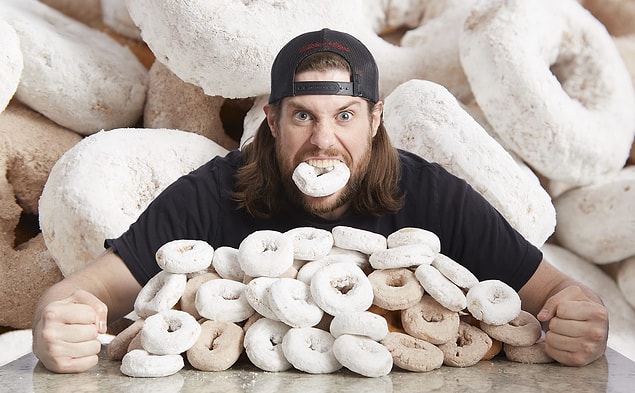 12. Most powdered doughnuts eaten in three minutes — nine doughnuts