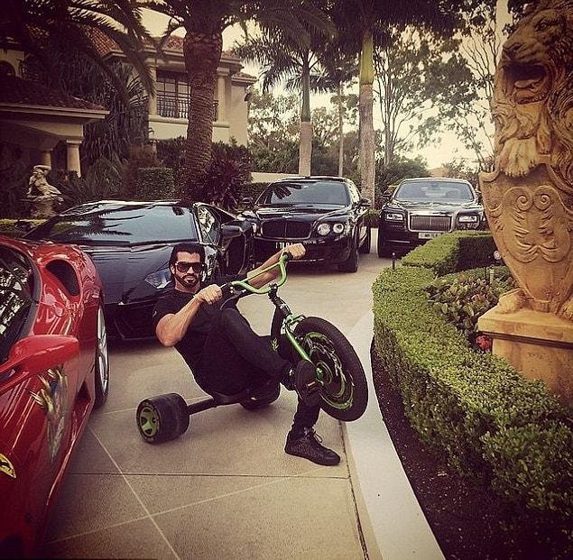 With his Roll Royces’, Ferraris and Lamborghinis, he lives a happy life!