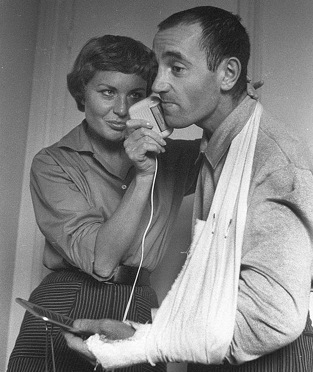 14. The singer Charles Aznavour with his wife Evelyne, 1956