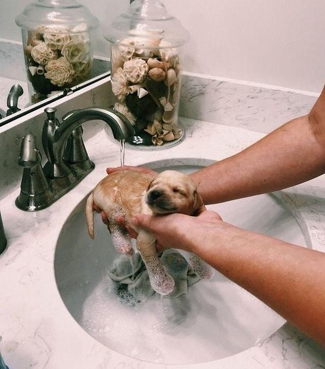 7. A happy and good boy is taking a bath for the first time.