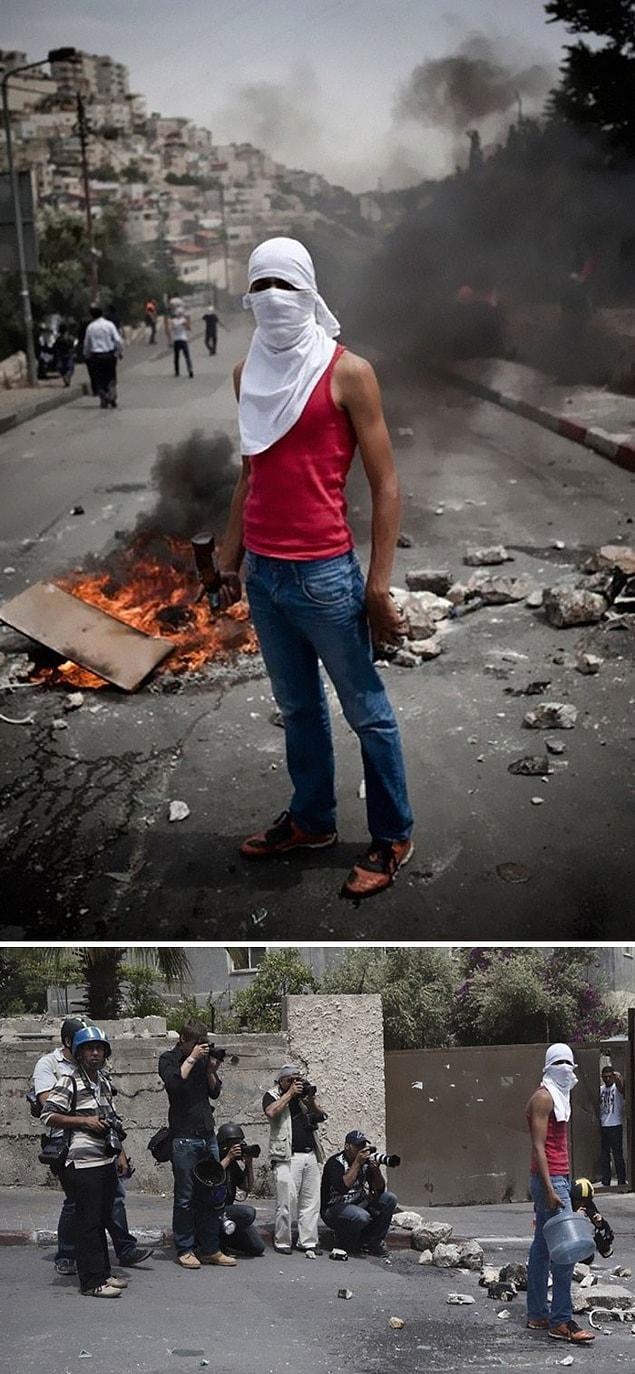 11. A staged photo of conflict between Israeli soldiers and Palestinian youths.