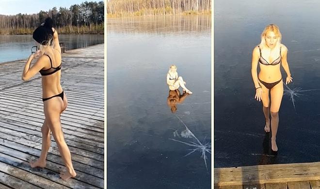 Gölün Buz Tutmuş Yüzeyine Atlayarak Kırmak İsteyen Kadının Dumura Uğradığı Anlar